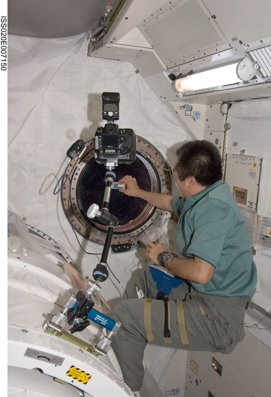 JAXA astronaut Koichi Wakata setting up camera equipment