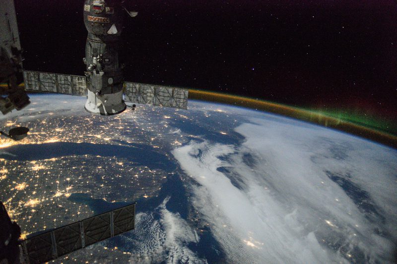 View of Earth and Soyuz module at night from the ISS