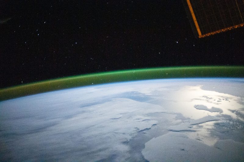 View of Earth and ISS solar panel