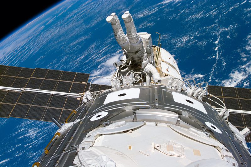 Astronaut James H. Newman on the 3rd and final EVA for Shuttle Mission 88